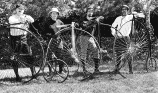 Four wheelmen and their wheels at the 1995 Good Roads Centennial meet.